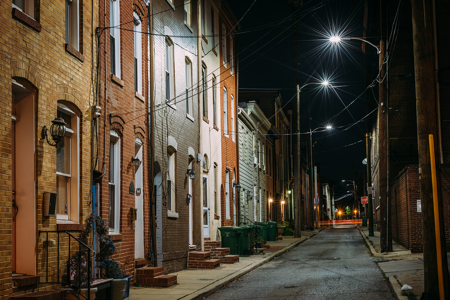 Neighborhood at night with streetlights