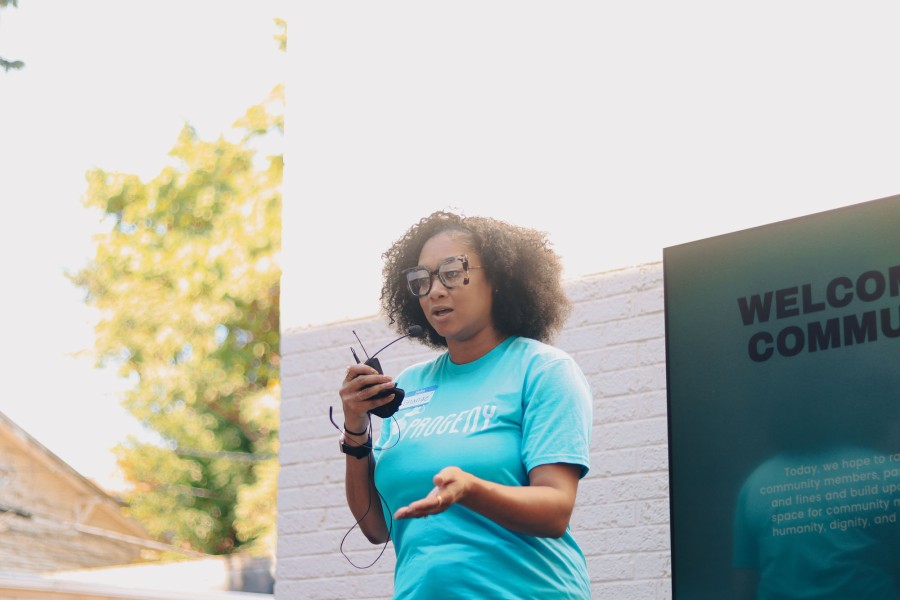 woman speaking on stage