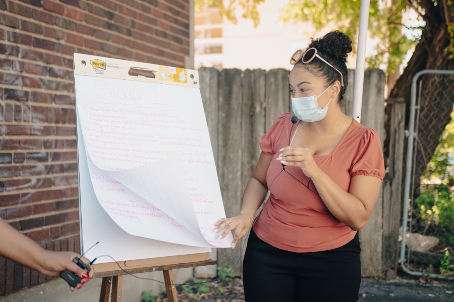 person holding poster board